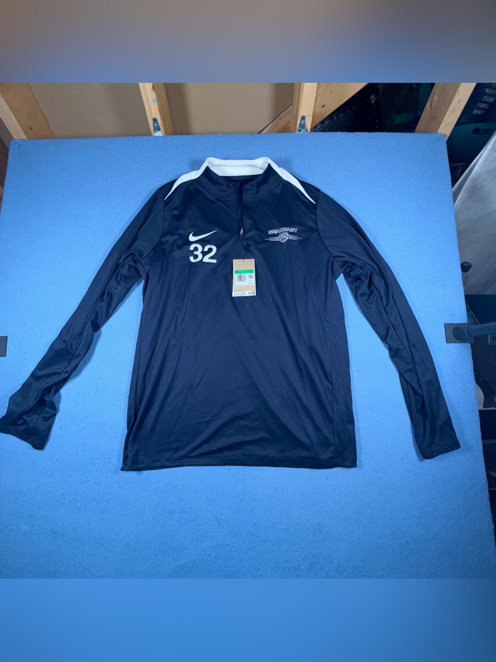 Nike Blue Long-Sleeve Athletic Top with White Accents and Number 32